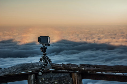 Camera on viewpoint fence in highest peak trail in Madeira, Portugal