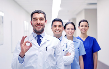 group of happy medics or doctors at hospital