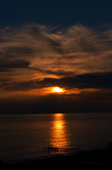 Fototapeta na wymiar Coucher de soleil en bord de mer