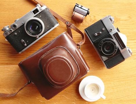 Vintage camera on wooden table
