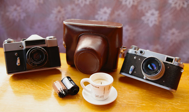 Vintage camera on wooden table
