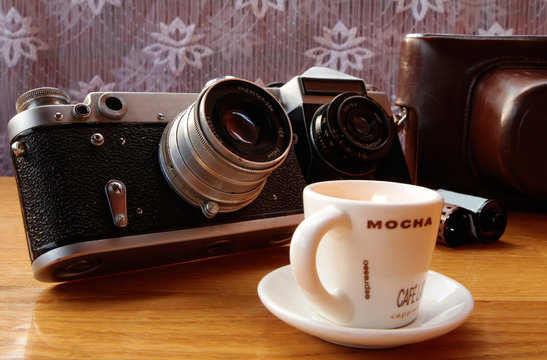 Vintage camera on wooden table