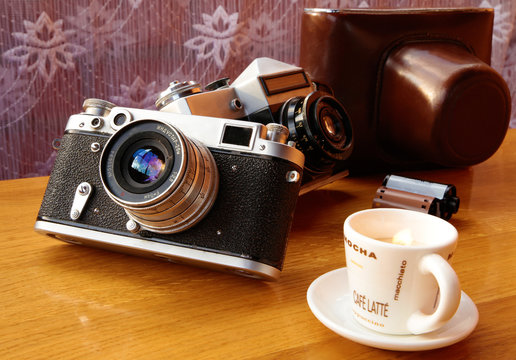 Vintage camera on wooden table
