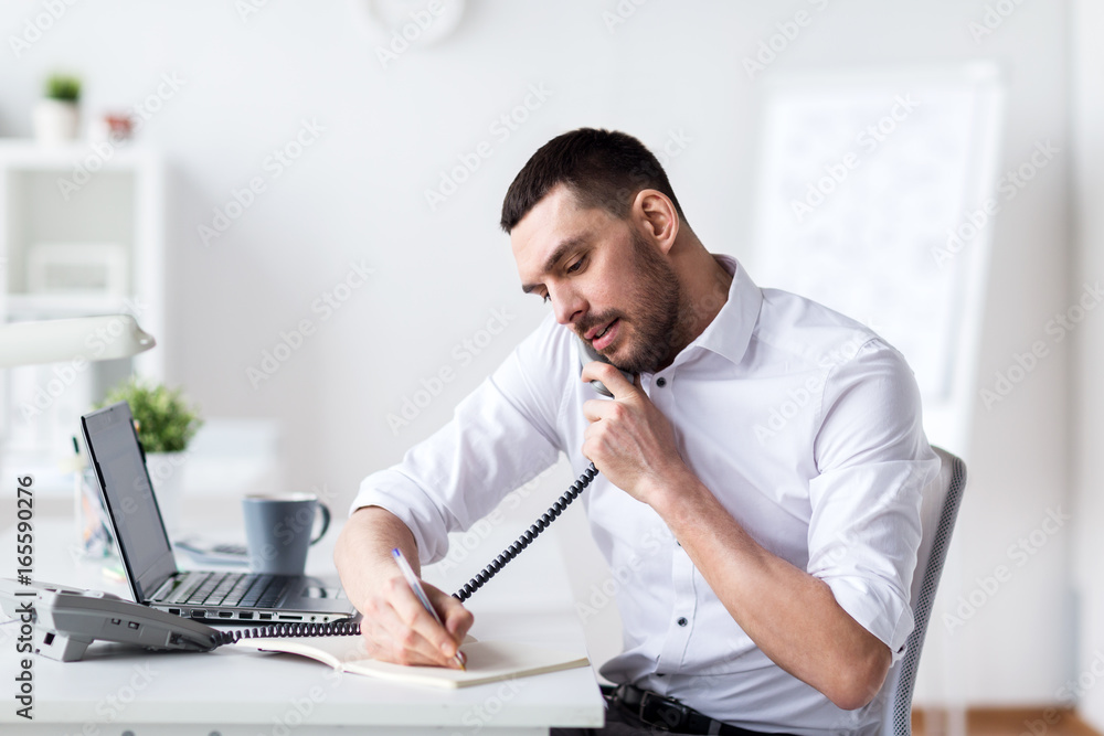 Sticker businessman with pad calling on phone at office