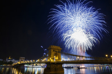 Fireworks in Budapest. View of the illuminated Chain Bridge and the Danube River