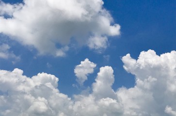 Naklejka na ściany i meble White cloudscape in the blue sky 