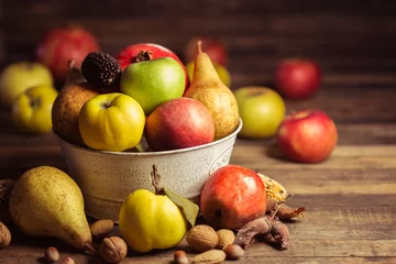 Zelfklevend Fotobehang Autumn fruits © pilipphoto