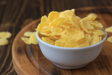 Corn flakes in bowl - cereal breakfast.