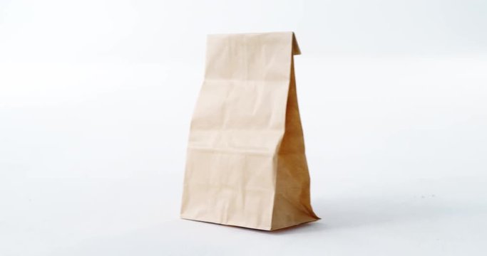 Brown shopping bag on white background
