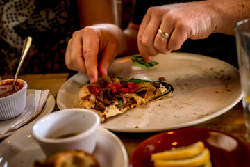 Delicious looking pizza in a restaurant setting 
