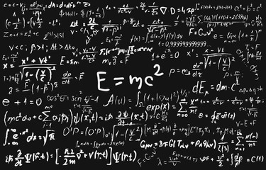 Blackboard inscribed with scientific formulas and calculations in physics and mathematics.