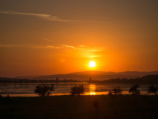 Fototapeta na wymiar sunset on Danube river at Moldova Noua. Romania