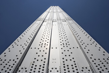 Metal pillar of bridge against blue sky - 165596820