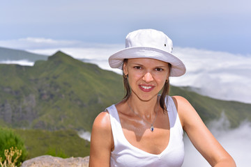 Young woman in clouds.