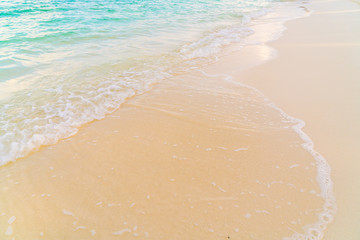 Beautiful tropical Maldives island with white sandy beach and sea .