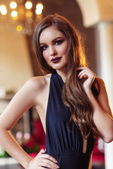Naklejka premium Fashion portrait of a beautiful young woman