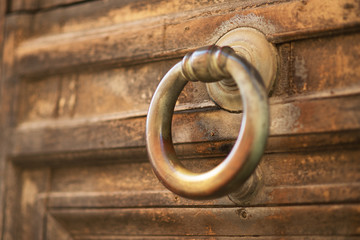 Old door handle in the form of a ring