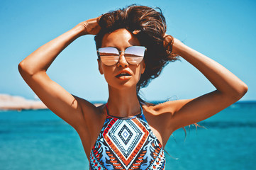 Beautiful happy woman at sea