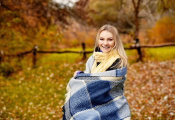 adult Woman with plaid in park