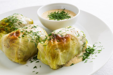 lahanodolmathes with broth based sauce and dill