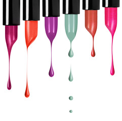Melting colored lipsticks with falling drops down isolated on white background
