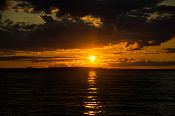 Obraz premium red Sunset over coast