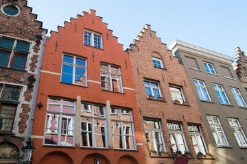 Traditional medieval red and white brickwall architecture of Bruges