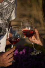 A young couple in love, on the shore of the Bay at sunset