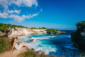 Girl relaxing on Bali coast