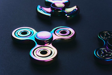 Group of hand fidget spinner toy.