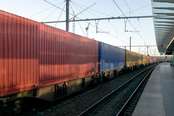 Fototapeta na wymiar Freight train with cargo containers