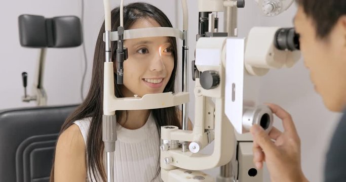 Woman doing eye test at the clinic