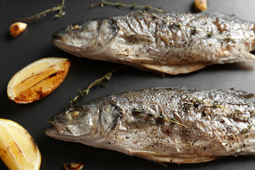 Fried fish on black  background