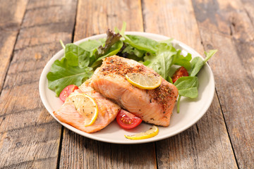 salmon with lemon and salad