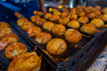 Close up of fried food located in a public market at Dotonbori district at Osaka Japan