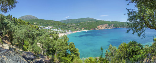 Summer scene - Olive trees and Lichnos beach near Parga, Greece - Ionian Sea - Panorama