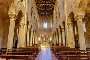 The central nave of the ancient Romanesque church of Sant'Antimo near Montalcino in Tuscany