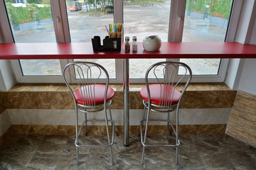 Roadside cafe. A snug place arranged on the tight space and for limited costs. Ukraine.