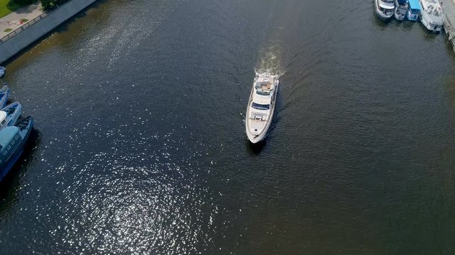 High angle of a boat moving along the river. 