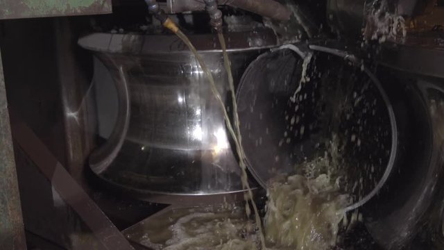 Rolling forming rolls metal works on manufacture of pipes. Rolling mill machine for rolling steel sheet. Rolling mill machine with cooling water close up