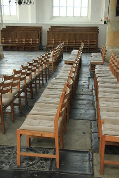 Wooden chairs in a church