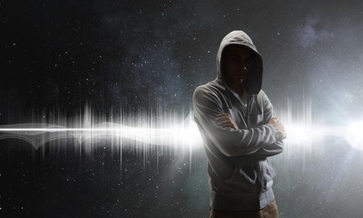 Silhouette of man in hoody