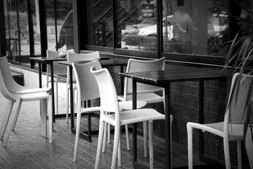 white plastic chairs in cafe