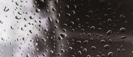 rain / droplets of water on Car mirror at Evening
