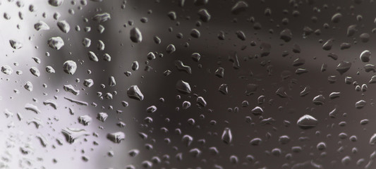 rain / droplets of water on Car mirror at Evening