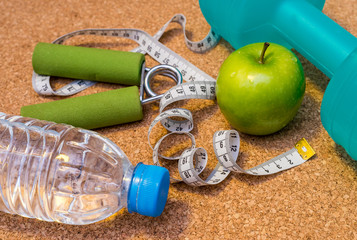 Lay Flat - Dumbbell, Fresh Apple, Measuring Tape, Mineral Water, Hand Grip - Fitness Concept