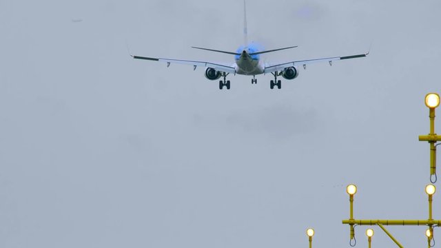 Aircraft landing on the runway of an airport