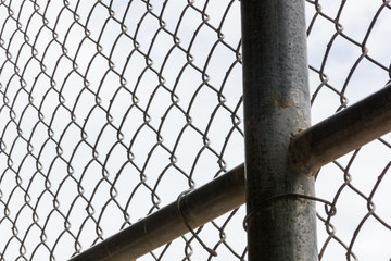 Lonely Clouds through Chainlink Fence The clouds are too lovely to be stuck behind this chainlink...