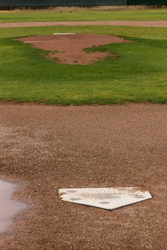 Rained Out Baseball Diamond and Mound: Looks like the games is totally rained out. Good time for some more practice. We're not winning the World Series today, but it'll happen soon enough.