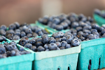 Blueberries for sale at a farmers market.